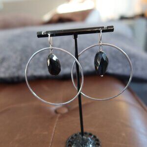 Black onyx and sterling silver large front facing hoops earrings by Dana Reed